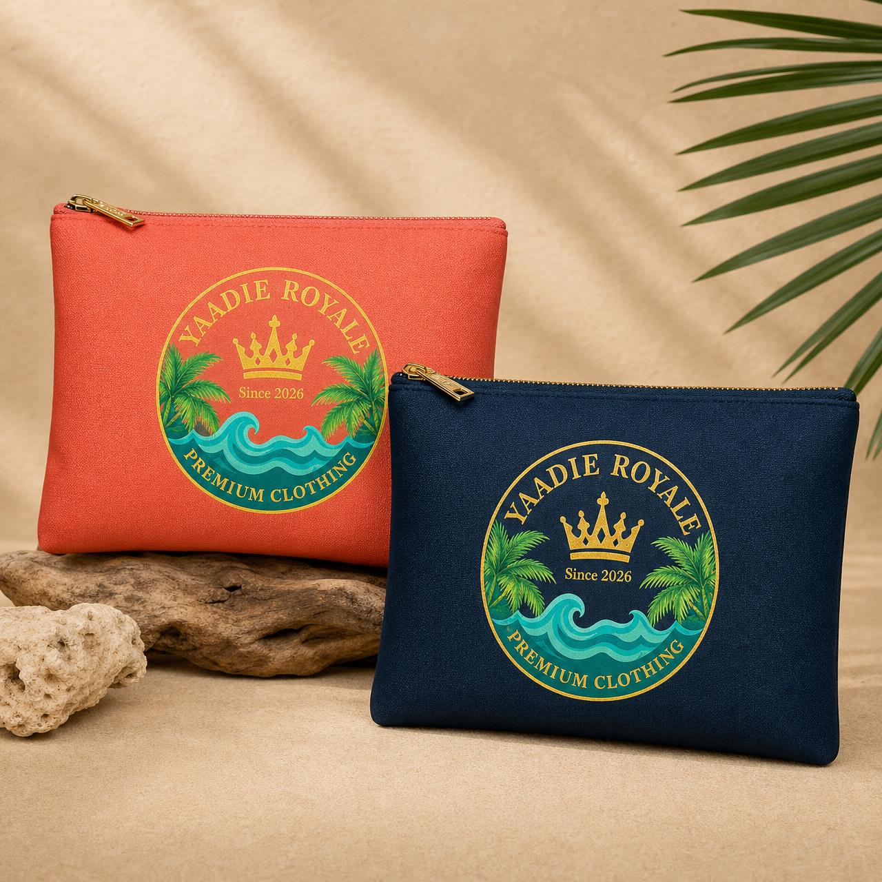 Yaadie Royale coral and navy zip pouches with the crest logo