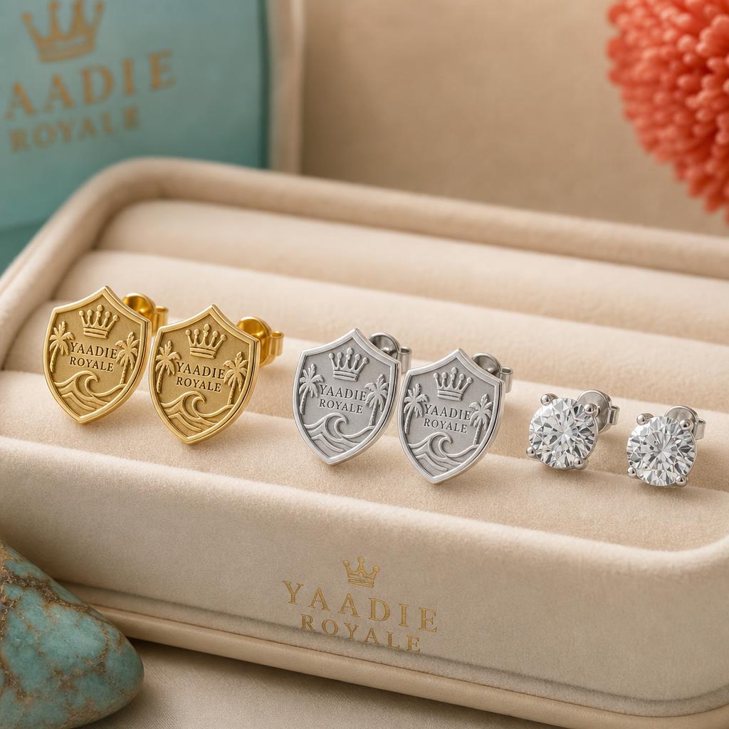 Yaadie Royale gold, silver and diamond stud earrings in a branded box